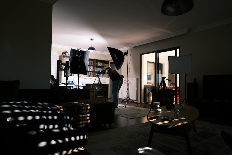A cozy home studio with professional lighting equipment for a photo session.