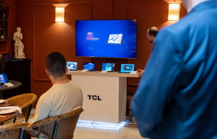 A modern showroom displaying advanced tablets, highlighting the importance of teleprompter cues in presentations