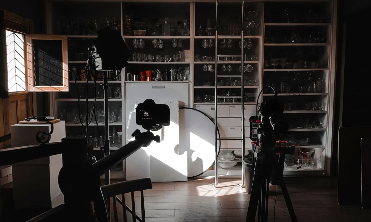 A photography studio set with cameras and lights, showing how on-camera confidence starts with a prepared space
