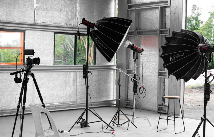 Emerging teleprompter technologies explored through an indoor Sydney studio with camera and lighting gear