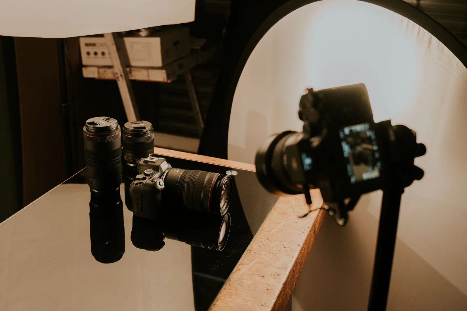 Professional camera with lens and studio lighting, highlighting trends in teleprompter technology